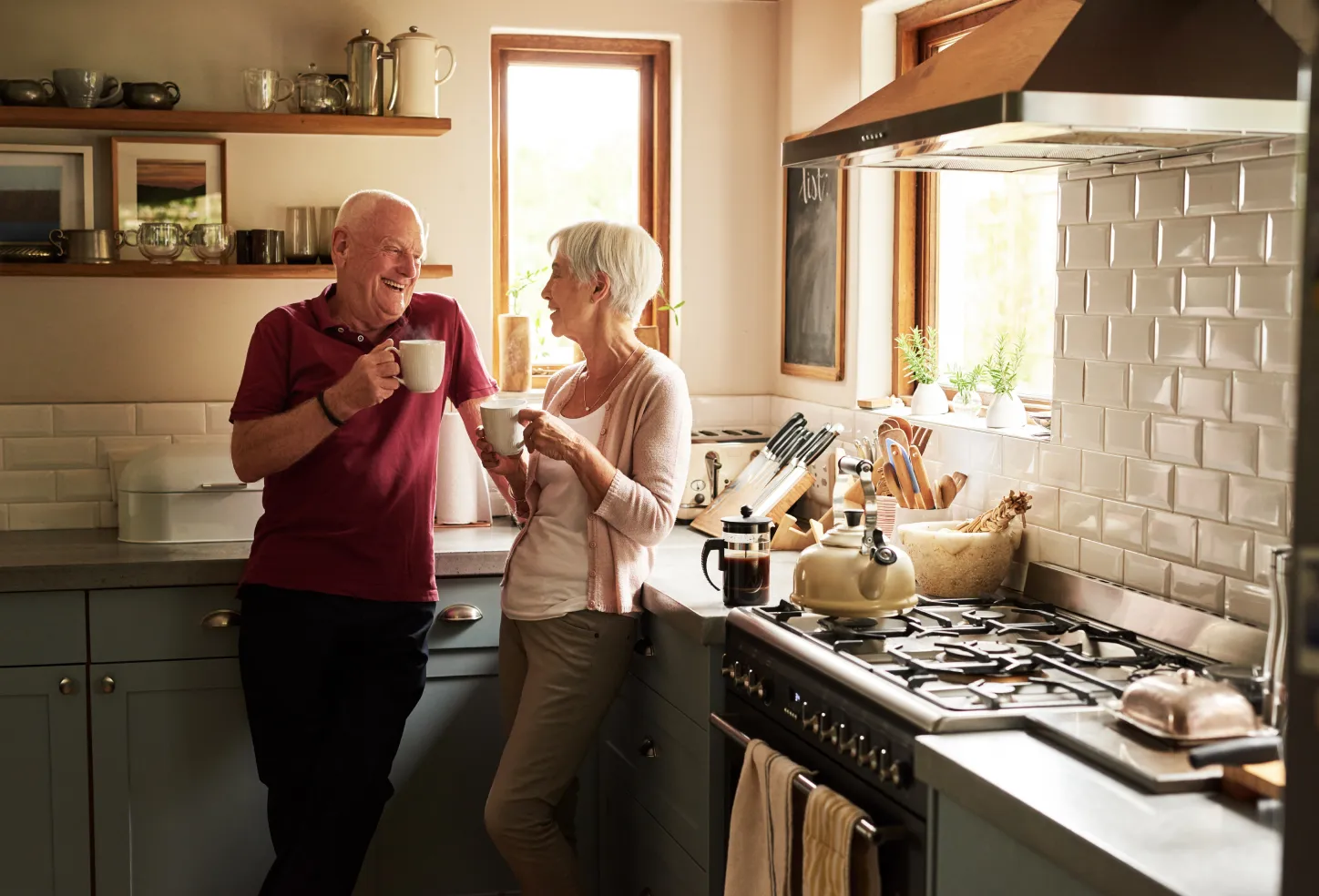 Homeowners enjoying coffee in their kitchen